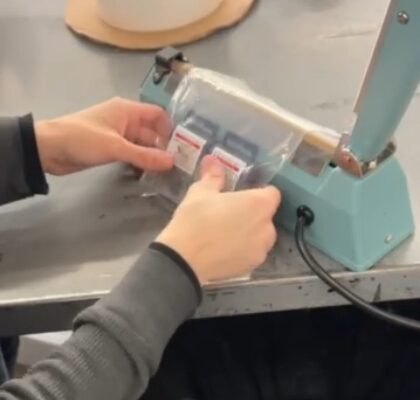 Nicky heat seals materials for Reeb Millwork.